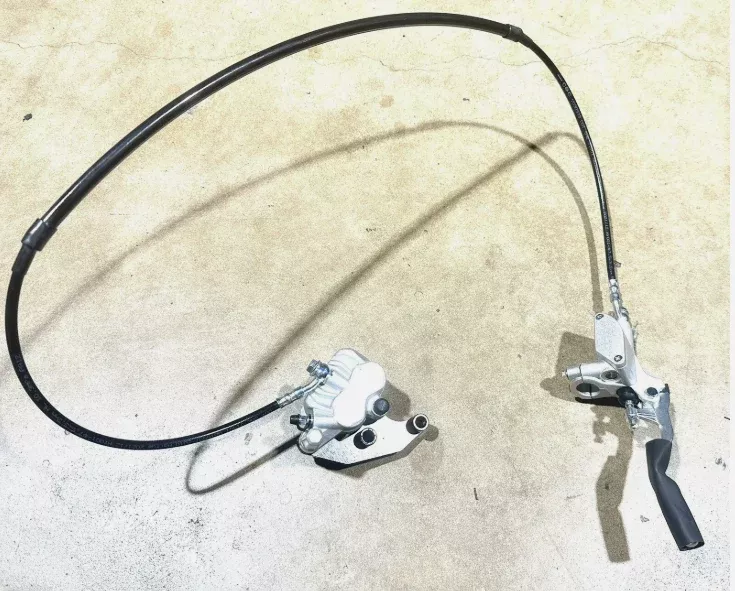 FRONT BRAKE ASSEMBLY FOR THUNDER 250CC